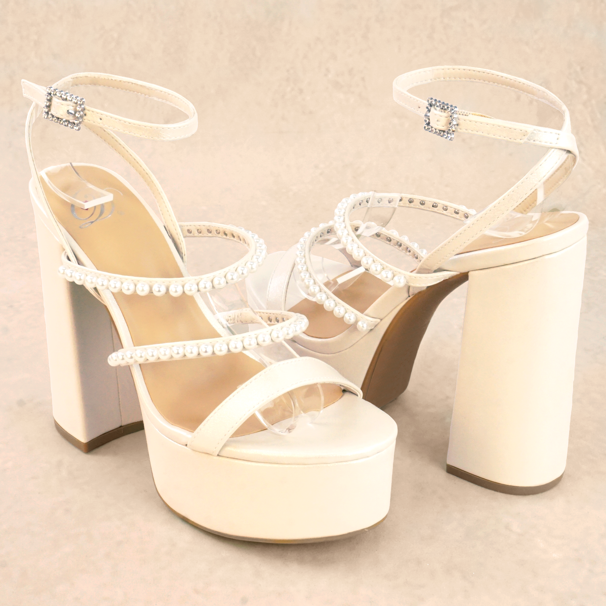 Prefer Pearl Platform High Heels